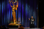 Jana Schmieding presents an award at the 2021 Creative Arts Emmys.