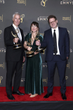 Mike Sweeney, Jessie Gaskel, and Matt O&#039;Brien pose with their award for Outstanding Writing for a Nonfiction Program for Conan O&#039;Brien Must Go backstage at the 76th Creative Arts Emmy Awards 