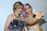 Socorro Maribojoc and Natalie Maribojoc take a selfie at the 67th Los Angeles Area Emmy Awards cocktail party July 25, 2015, at the Skirball Cultural Center in Los Angeles, California.