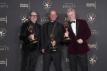 Mark Scruton, Adrian Curelea, and Robert Hepburn, production design team for Wednesday, backstage at the 75th Creative Arts Emmy Awards