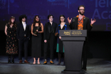 Lucy Hirschfeld, from left, Bijan Kazerooni, Sayali Upadhye, Vivian Gray, Julia Elizabeth Evans, and Caleb Townsend of University of Southern California accept the drama award for &quot;Provenance&quot;