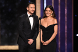 Jonathan Tucker and Sarah Shahi present an award at the 2019 Creative Arts Emmy Awards.