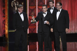 Keith Rogers and the team of Westworld accept their award at the 2017 Creative Arts Emmys. 