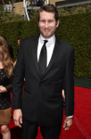 Scott Aukerman arrives for the 2014 Primetime Creative Arts Emmys.