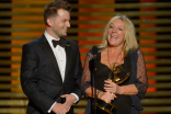 Adam James Phillips and Magi Vaughn accept the award for outstanding hairstyling on Downton Abbey.