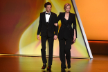 Luke Kirby and Jane Lynch present an award at the 71st Emmy Awards.