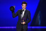 Jason Bateman accepts an award at the 71st Emmy Awards.