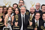 Jon Stewart and the cast and crew backstage at the 67th Emmy Awards.