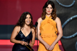 America Ferrara and Mandy Moore on stage at the 2016 Primetime Emmys.