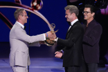 Joshua Jackson and Matt Bomer present the Governors Award to Greg Berlanti during the 76th Emmy Awards